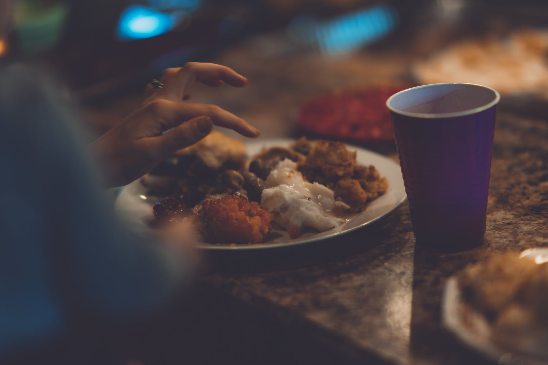 plate of cooked food beside cup