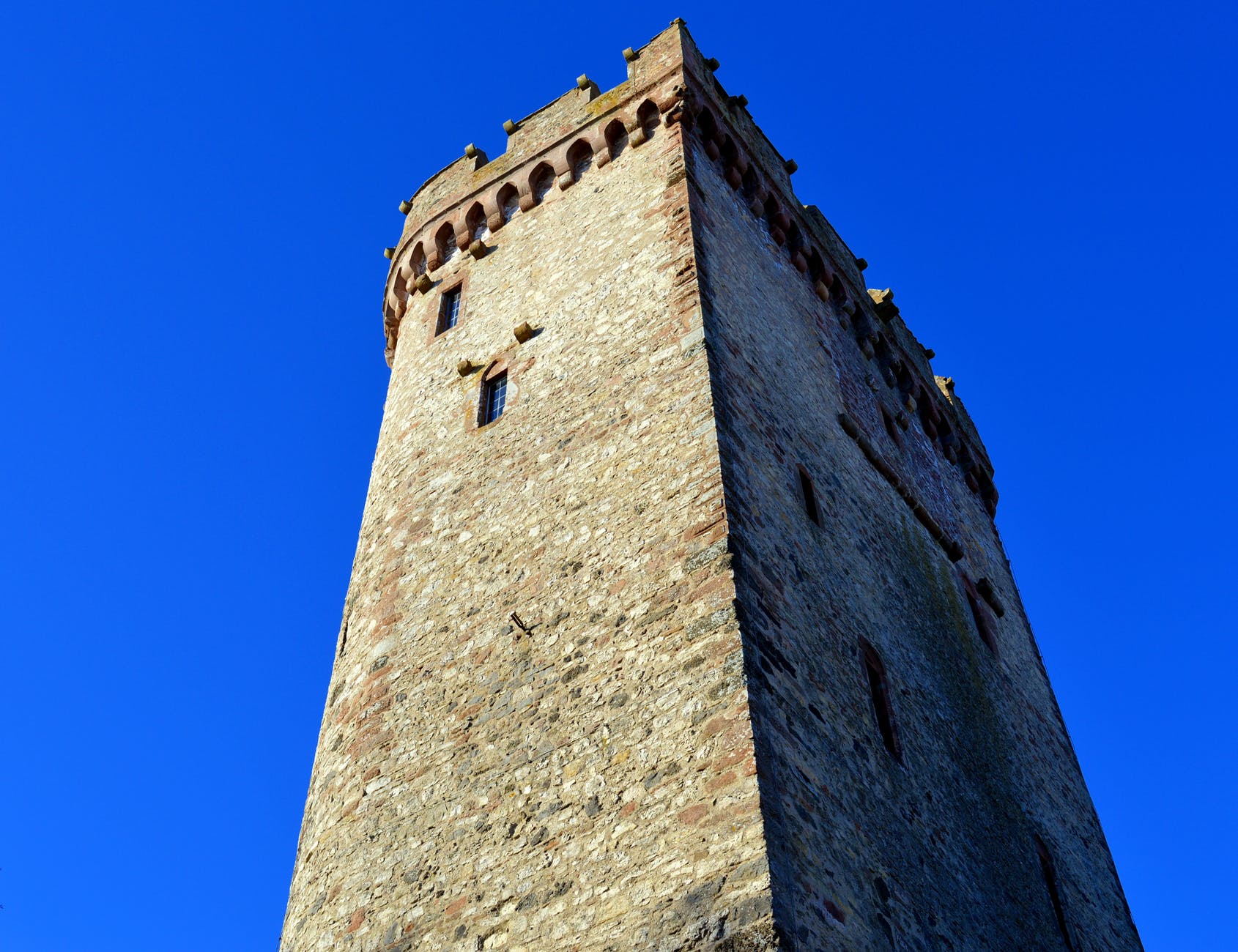 low angle view of tower against clear blue sky