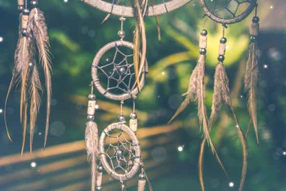 selective focus photo of brown dreamcatcher