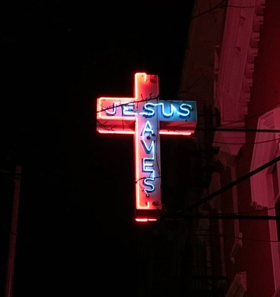 jesus saves neon signage