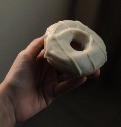 donut with white cream on top