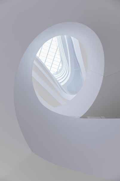 white concrete spiral staircase