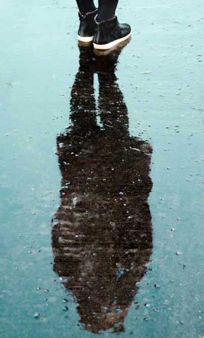 shadow of person on water during daytime