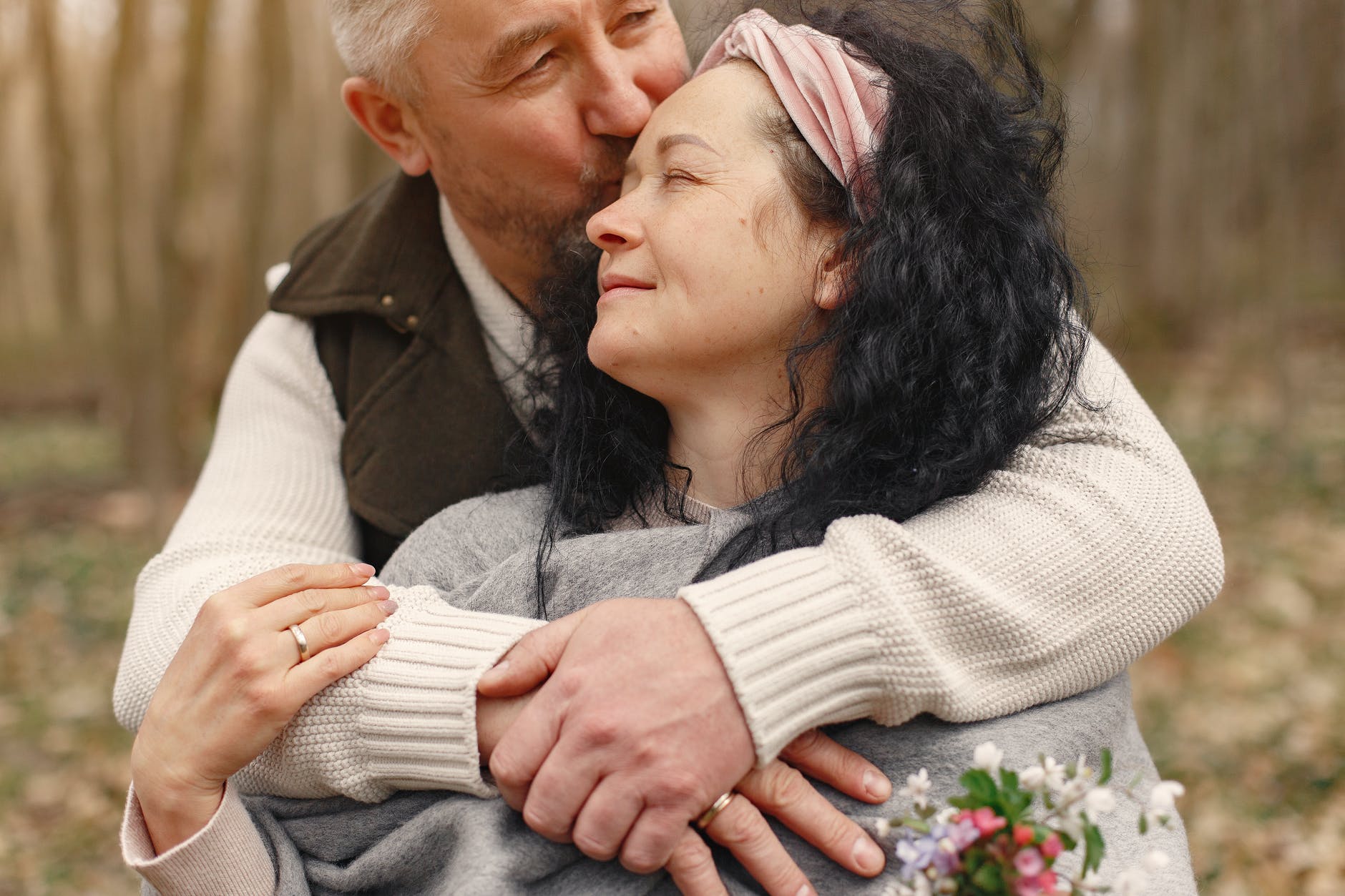 man kissing his woman